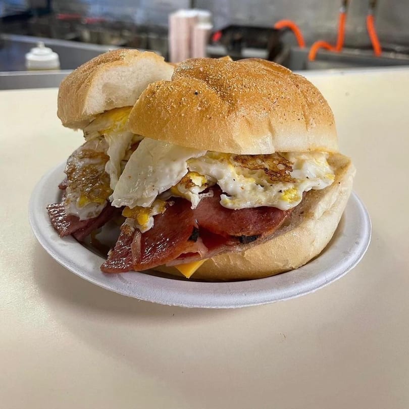A Jersey Johnny's Grill pork roll, egg, and cheese sandwich on a Kaiser roll.